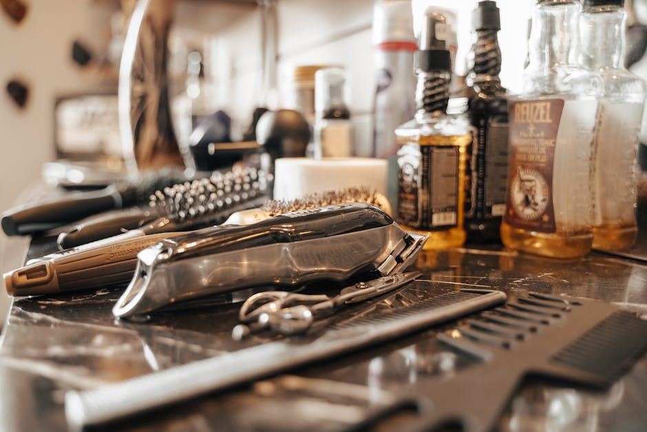 Professional barber creating a masterful haircut in modern barbershop setting